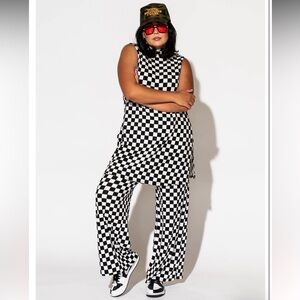 Dressed in Lala Gigi Sleeveless Ribbed Playsuit in Black + White Check